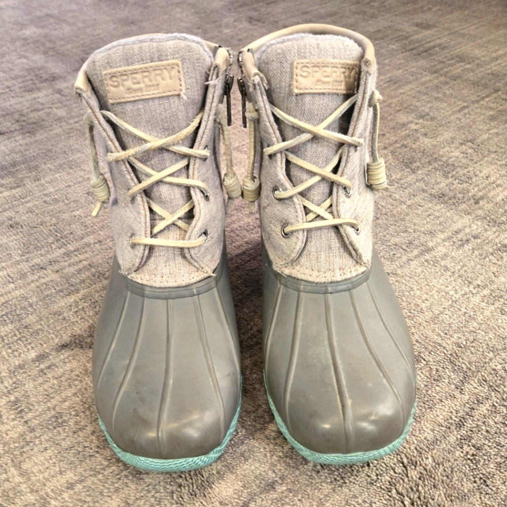 Grey and blue Sperry boots